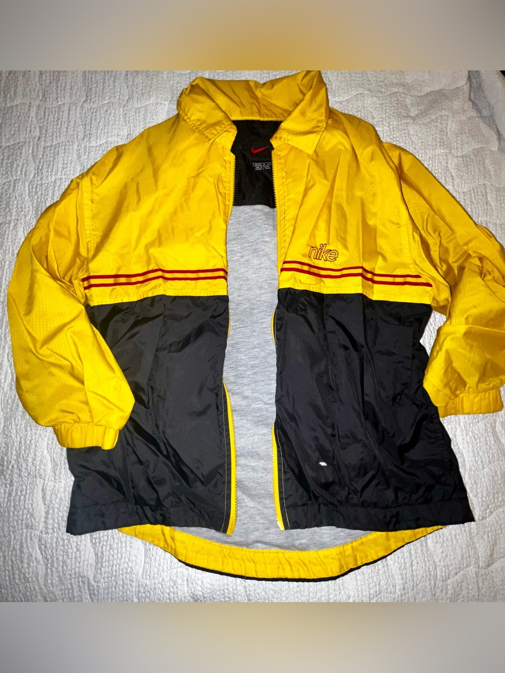 Vintage 1990’s Youth Nike Yellow and Black Windbreaker with Red Stripe Accents